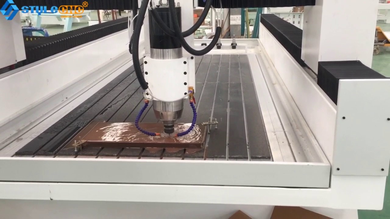 直排式自動(dòng)換刀石材數(shù)控雕刻機(jī)出售